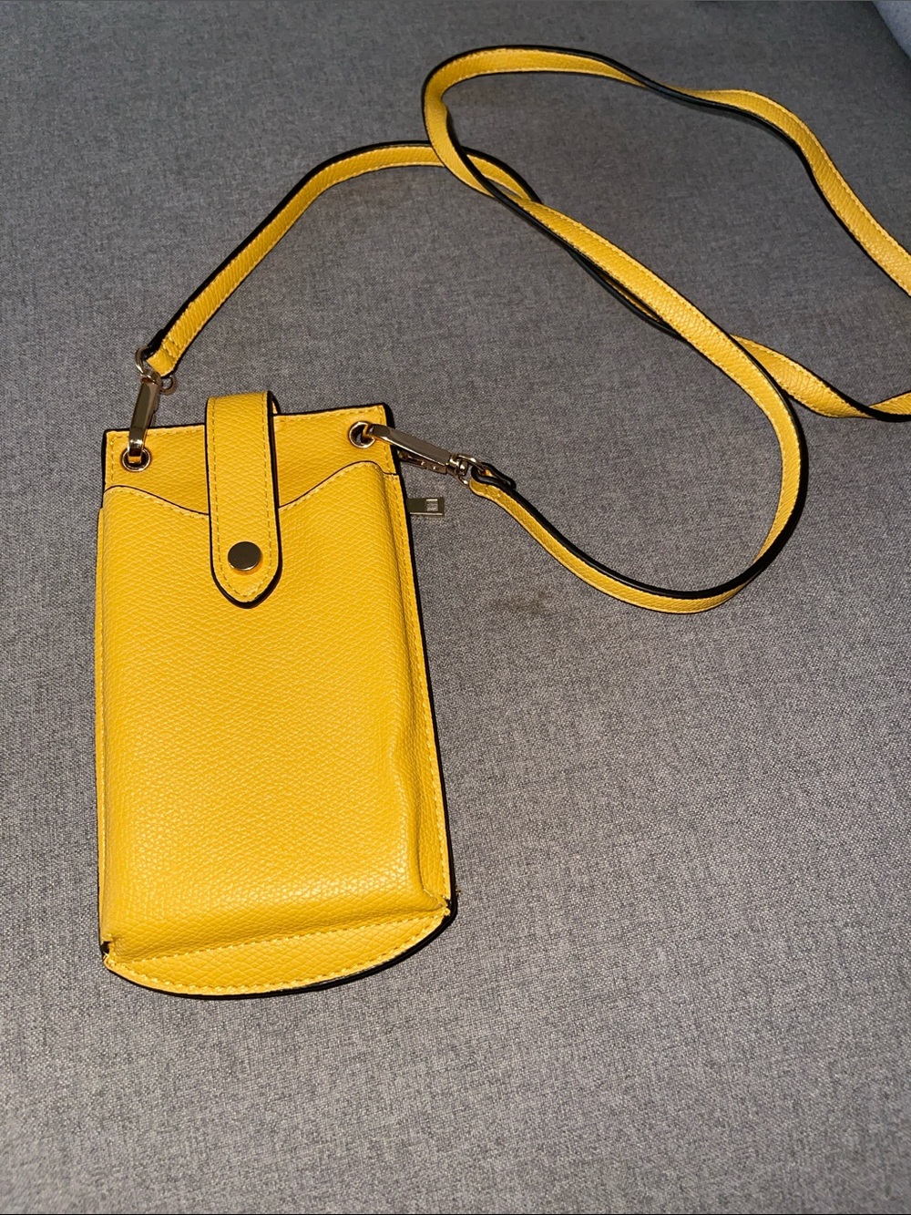 Compact Yellow Crossbody Bag with Snap Strap